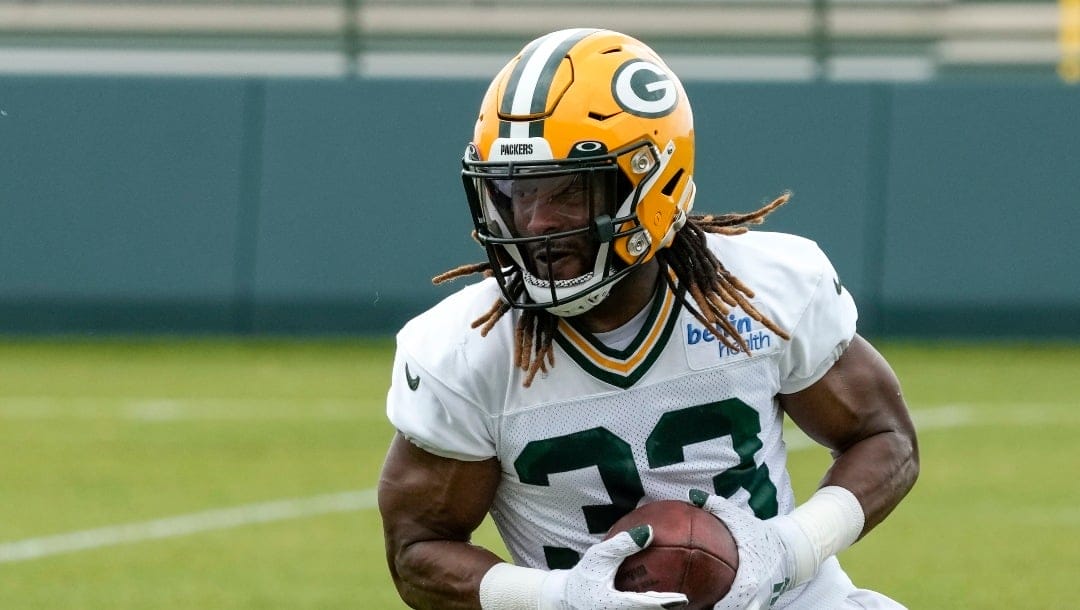Green Bay Packers' Aaron Jones runs during an NFL football OTA practice session Wednesday, May 31, 2023, in Green Bay, Wis. (AP Photo/Morry Gash)