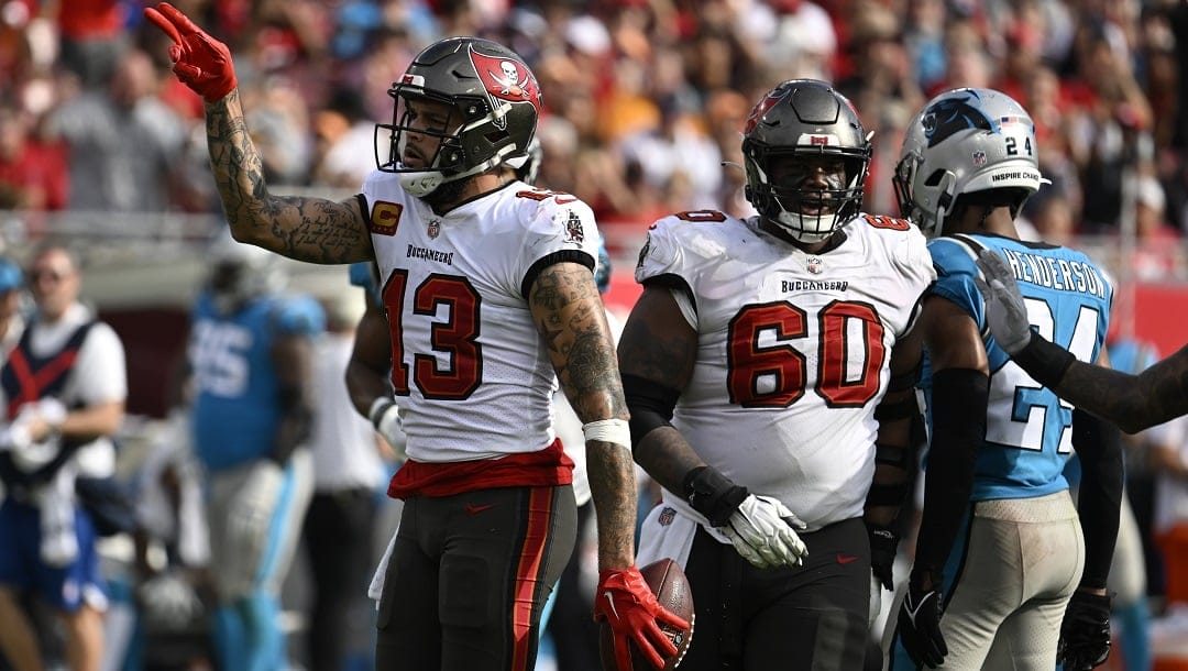 Tampa Bay Buccaneers wide receiver Mike Evans (13) signals first down against the Carolina Panthers during the first half of an NFL football game Sunday, Jan. 1, 2023, in Tampa, Fla.