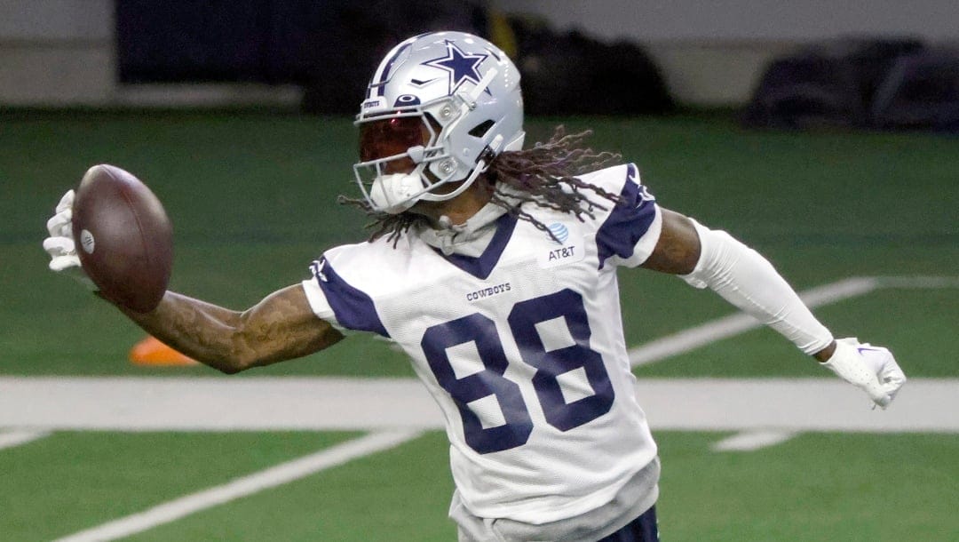 Dallas Cowboys wide receiver CeeDee Lamb (88) makes a catch during an NFL football practice at the team's training facility in Frisco, Texas, Thursday, May 25, 2023. (AP Photo/Michael Ainsworth)
