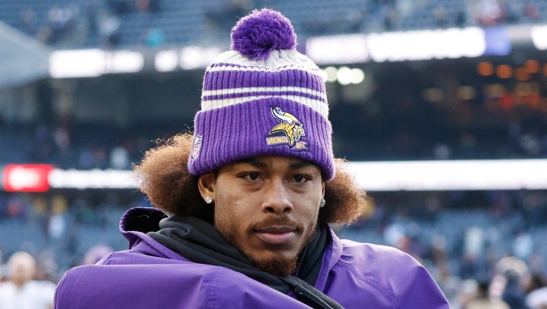 Minnesota Vikings wide receiver Justin Jefferson walks off the field after an NFL football game against the Chicago Bears, Sunday, Jan. 8, 2023, in Chicago. (AP Photo/Kamil Krzaczynski)