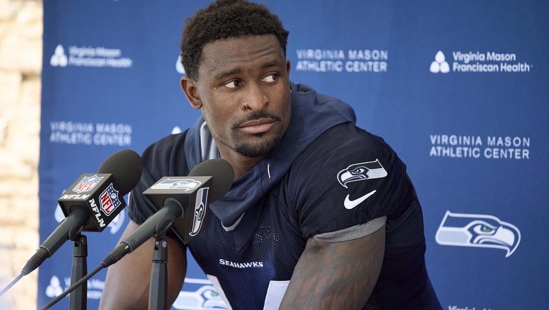 Seattle Seahawks wide receiver DK Metcalf talks to the news media after an NFL football practice, Wednesday, June 7, 2023, team's facilities in Renton, Wash.