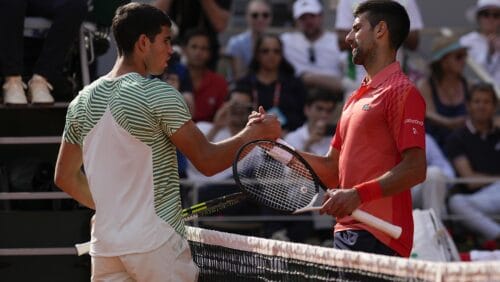 Serbia's Novak Djokovic, right, is congratulated by Spain's Carlos Alcaraz after Djokovic won the semifinal match of the French Open tennis tournament in four sets, 6-3, 5-7, 6-1, 6-1, at the Roland Garros stadium in Paris, Friday, June 9, 2023.