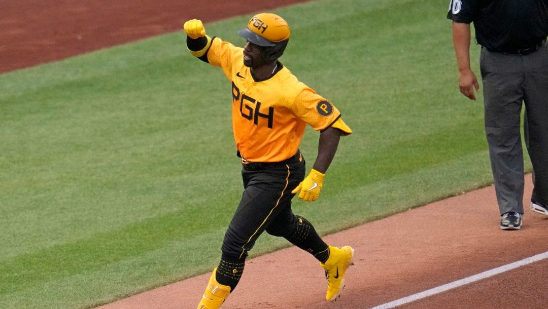 Pittsburgh Pirates' Andrew McCutchen rounds third after hitting a solo home run off starting pitcher Freddy Peralta (51) during the fourth inning of a baseball game in Pittsburgh, Friday, June 30, 2023.