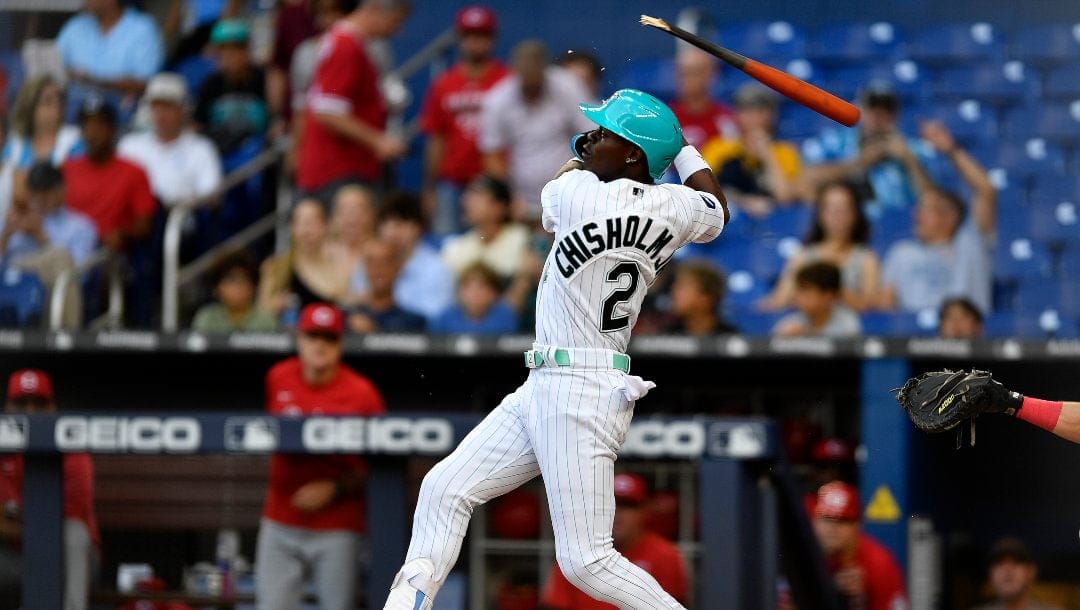 Miami Marlins' Jazz Chisholm Jr. (2) breaks his bat during the first inning of the team's baseball game against the Cincinnati Reds, Friday, May 12, 2023, in Miami. Chisholm grounded out on the at-bat.