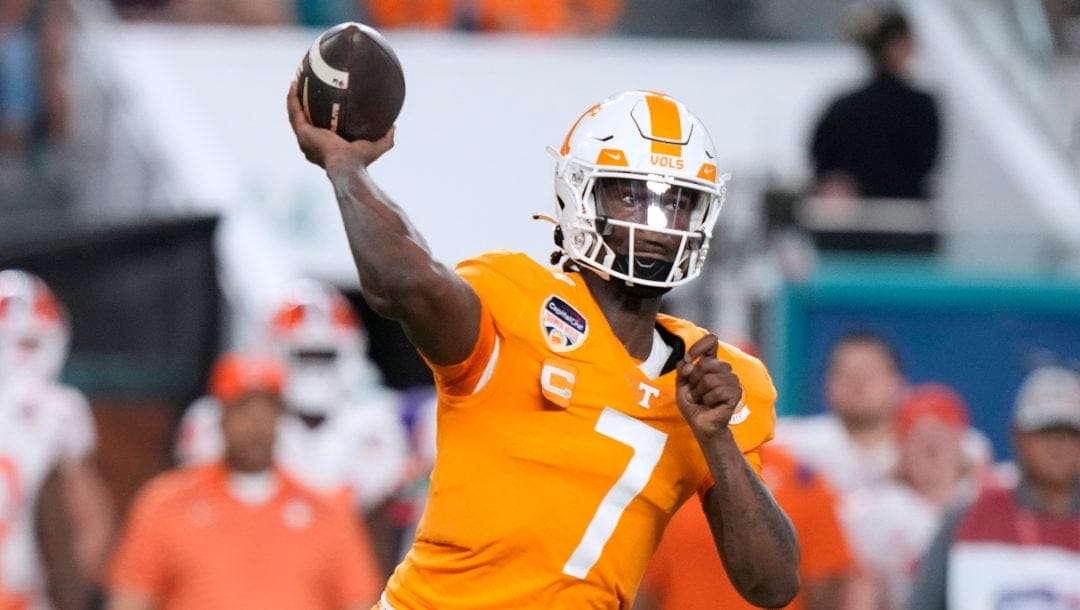 Tennessee quarterback Joe Milton III throws a pass during the first half of the team's Orange Bowl NCAA college football game against Clemson, Dec. 30, 2022, in Miami Gardens, Fla. Sixth-year Tennessee quarterback Milton will get the chance to showcase how much he’s grown in the upcoming season.