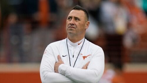 Texas head coach Steve Sarkisian watches his team during warmups before an NCAA college football game against Baylor in Austin, Texas, Friday, Nov. 25, 2022.