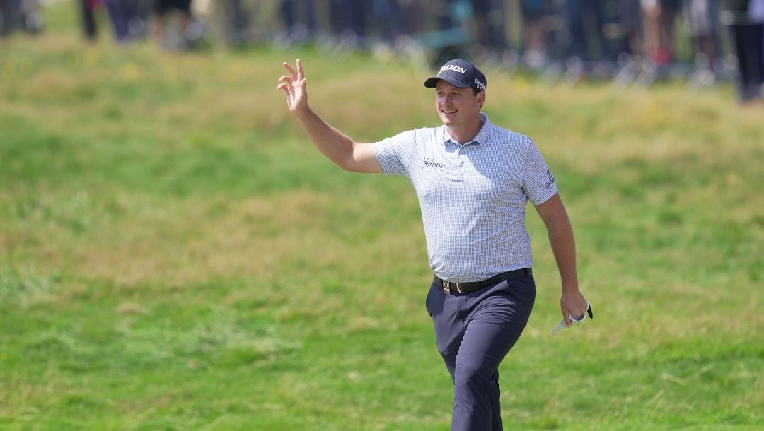 Austria's Sepp Straka celebrates after making a birdie putt on the 18th green on the first day of the British Open Golf Championships at the Royal Liverpool Golf Club in Hoylake, England, Thursday, July 20, 2023.