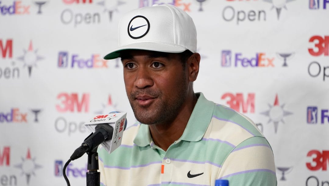Tony Finau responds to questions during a news conference following his win in the 3M Open golf tournament at the Tournament Players Club in Blaine, Minn., Sunday, July 24, 2022.