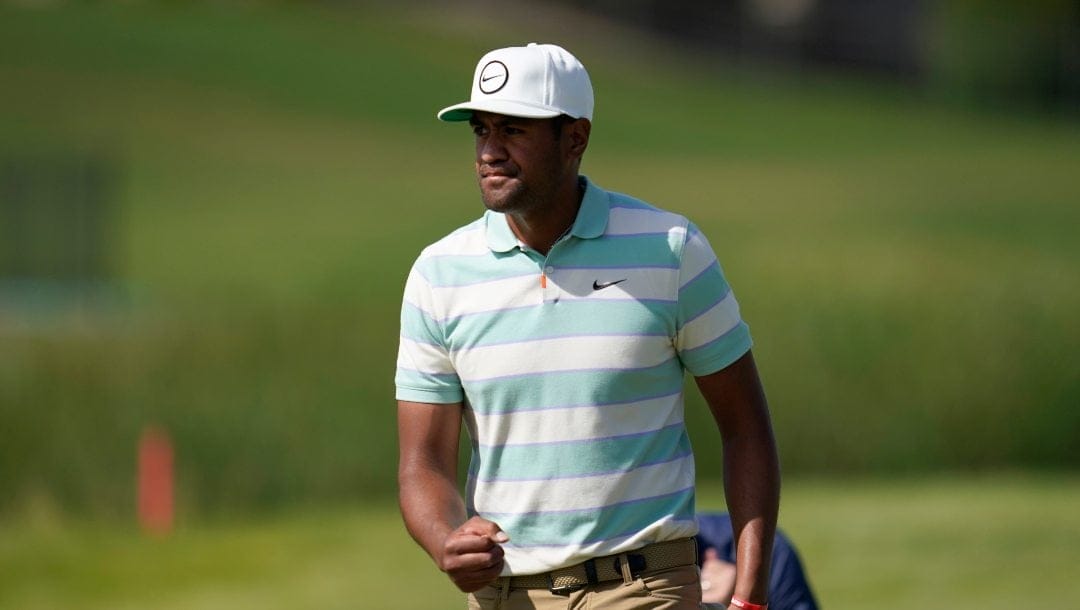 Tony Finau pumps his fist after sinking his putt for birdie on the 16th hole during the final round of the 3M Open golf tournament at the Tournament Players Club in Blaine, Minn., Sunday, July 24, 2022.