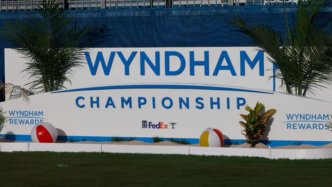 The tournament banner is on display on the 10th tee box during the first round of the Wyndham Championship golf tournament, Thursday, Aug. 4, 2022, in Greensboro, N.C.