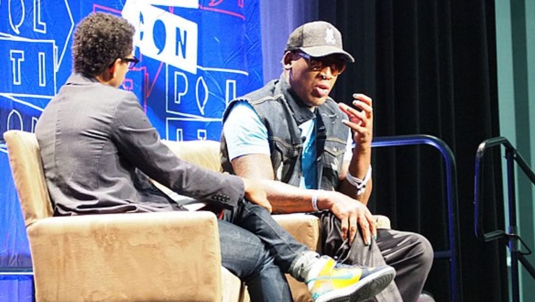Dennis Rodman doing an interview during a convention in October 2018.