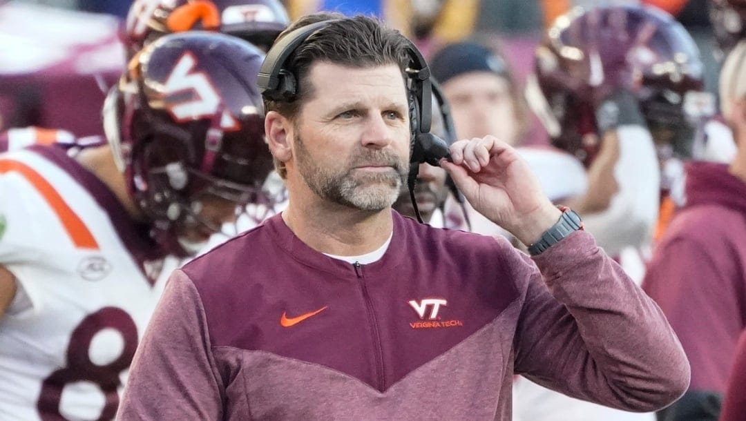 Virginia Tech head coach Brent Pry watches as his team plays against Pittsburgh during the second half of an NCAA college football game, Saturday, Oct. 8, 2022, in Pittsburgh. Pittsburgh won 45-29. (AP Photo/Keith Srakocic)
