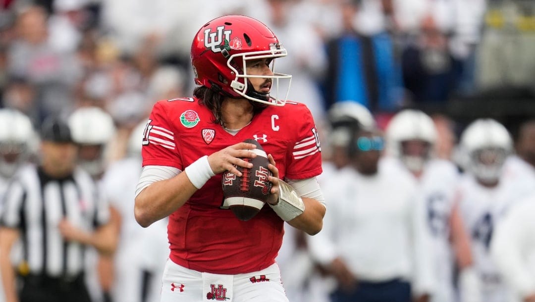 Utah quarterback Cameron Rising (7) sets up to throw a pass during the first half in the Rose Bowl NCAA college football game against Penn State Monday, Jan. 2, 2023, in Pasadena, Calif. (AP Photo/Marcio Jose Sanchez)