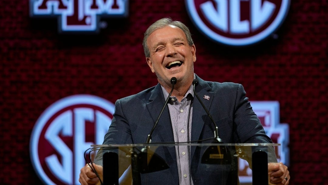 Texas A&M head coach Jimbo Fisher laughs as he responds to questions during NCAA college football Southeastern Conference Media Days, Monday, July 17, 2023, in Nashville, Tenn. (AP Photo/George Walker IV)