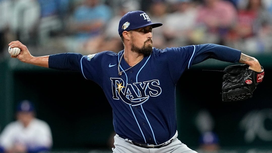 Tampa Bay Rays relief pitcher Shawn Armstrong throws to the Texas Rangers in a baseball game, Wednesday, July 19, 2023, in Arlington, Texas. (AP Photo/Tony Gutierrez)