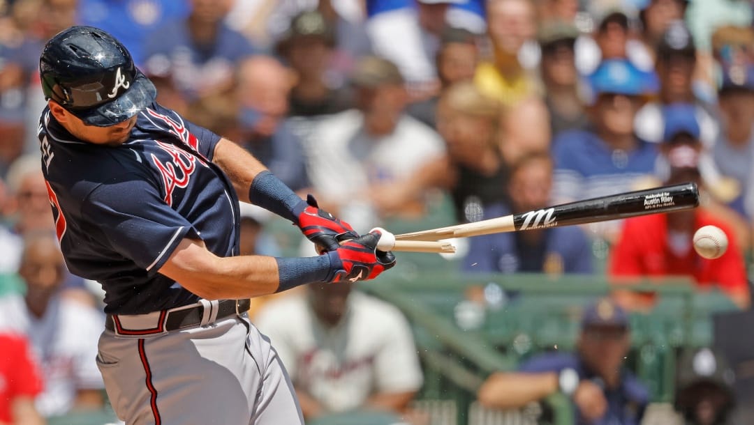 Atlanta Braves' Austin Riley breaks his bat during the first inning of a baseball game against the Milwaukee Brewers, Sunday, July 23, 2023, in Milwaukee. (AP Photo/Jeffrey Phelps)