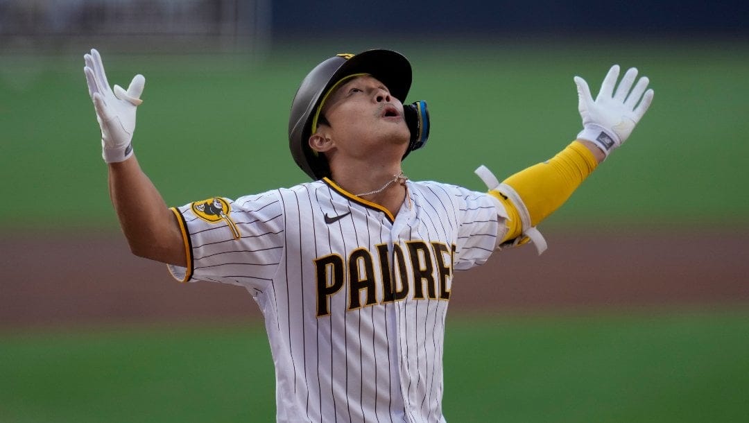 San Diego Padres' Ha-Seong Kim reacts after hitting a home run during the first inning of a baseball game against the Pittsburgh Pirates, Monday, July 24, 2023, in San Diego.