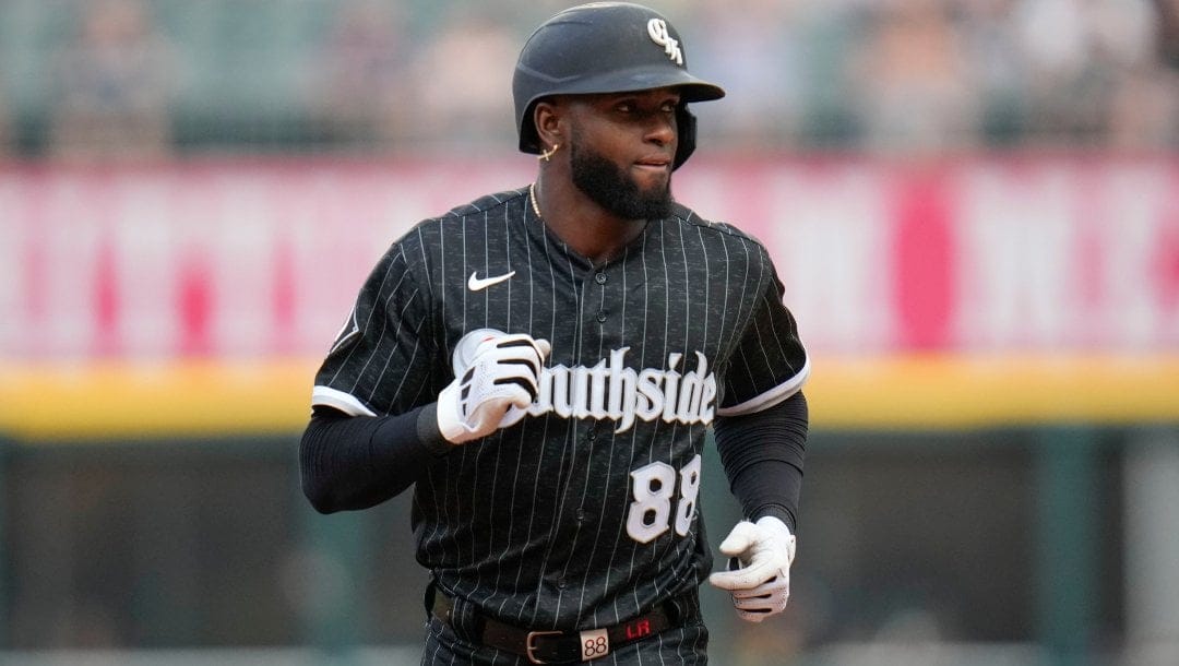 Chicago White Sox's Luis Robert Jr. runs the bases after hitting a home run during the first inning of a baseball game against the Cleveland Guardians Friday, July 28, 2023, in Chicago.