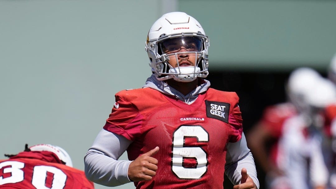 Arizona Cardinals running back James Conner warms up during mini camp practice at the team's NFL football training facility Tuesday, June 13, 2023, in Tempe, Ariz. (AP Photo/Ross D. Franklin)