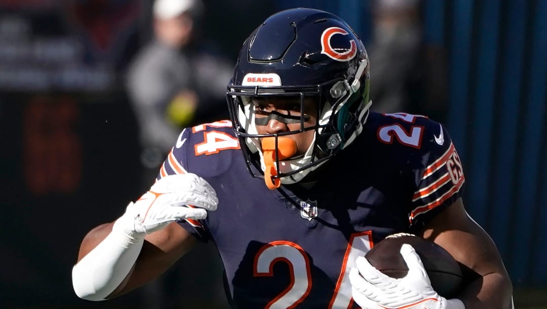 Chicago Bears running back Khalil Herbert carries the ball during an NFL football game against the Miami Dolphins Sunday, Nov. 6, 2022, in Chicago. (AP Photo/Charles Rex Arbogast)