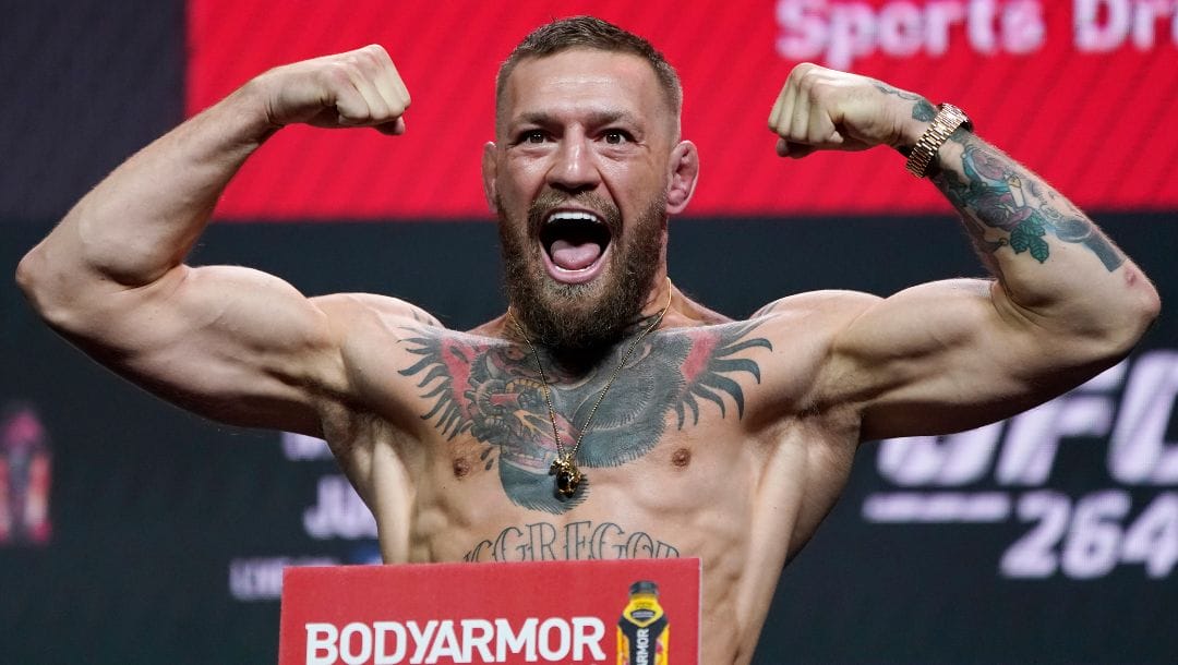 Conor McGregor poses during a ceremonial weigh-in for a UFC 264 mixed martial arts bout Friday, July 9, 2021, in Las Vegas.