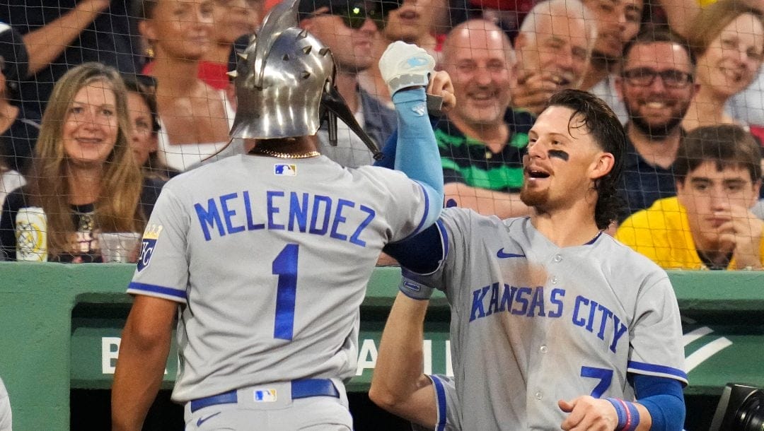 Kansas City Royals' MJ Melendez (1) is congratulated by Bobby Witt Jr. (7) after his solo home run against the Boston Red Sox during the fourth inning of a baseball game at Fenway Park, Wednesday, Aug. 9, 2023, in Boston.