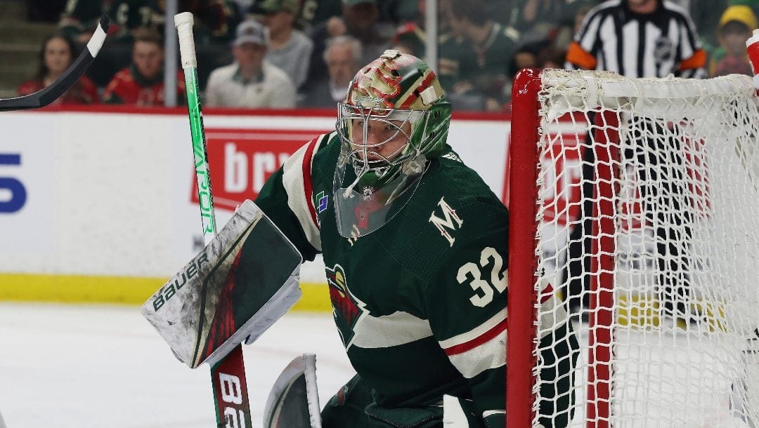 Minnesota Wild goaltender Filip Gustavsson (32) defends the net against against the Dallas Stars during the second period of Game 4 of an NHL hockey Stanley Cup first-round playoff series Sunday, April 23, 2023, in St. Paul, Minn.