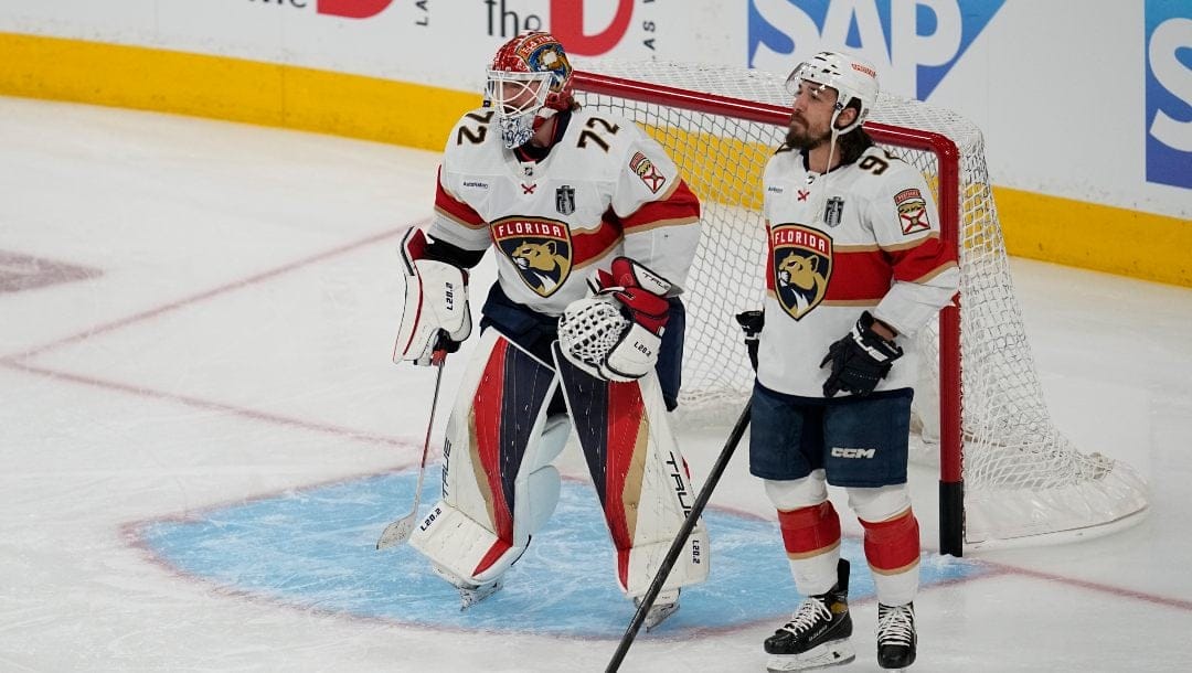 Florida Panthers goaltender Sergei Bobrovsky (72) and left wing Ryan Lomberg (94) warm up prior to Game 2 of the NHL hockey Stanley Cup Finals against Vegas Golden Knights, Monday, June 5, 2023, in Las Vegas.