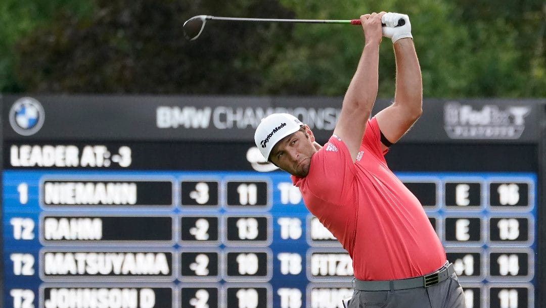 Jon Rahm hits from the 14th tee during the final round of the BMW Championship golf tournament at the Olympia Fields Country Club in Olympia Fields, Ill., Sunday, Aug. 30, 2020.