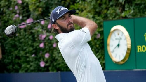 Max Homa watches his tee shot on the first hole during the final round of the BMW Championship golf tournament, Sunday, Aug. 20, 2023, in Olympia Fields, Ill.