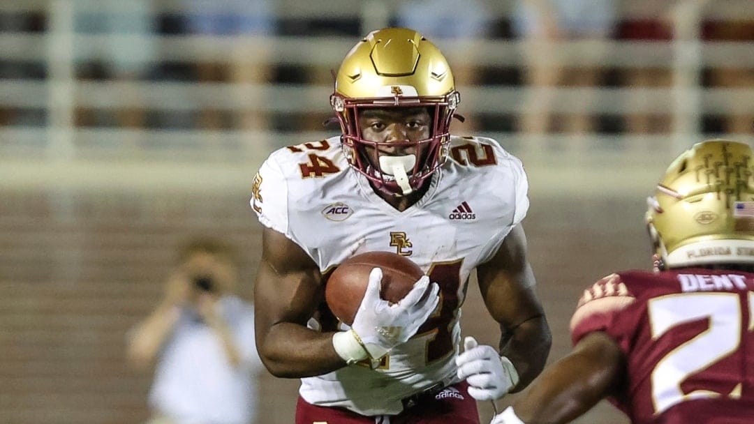 Boston College running back Pat Garwo III (24) runs the ball for a first down during the third quarter of an NCAA college football game against Florida State on Saturday, Sept. 24, 2022, in Tallahassee, Fla. (AP Photo/Gary McCullough)