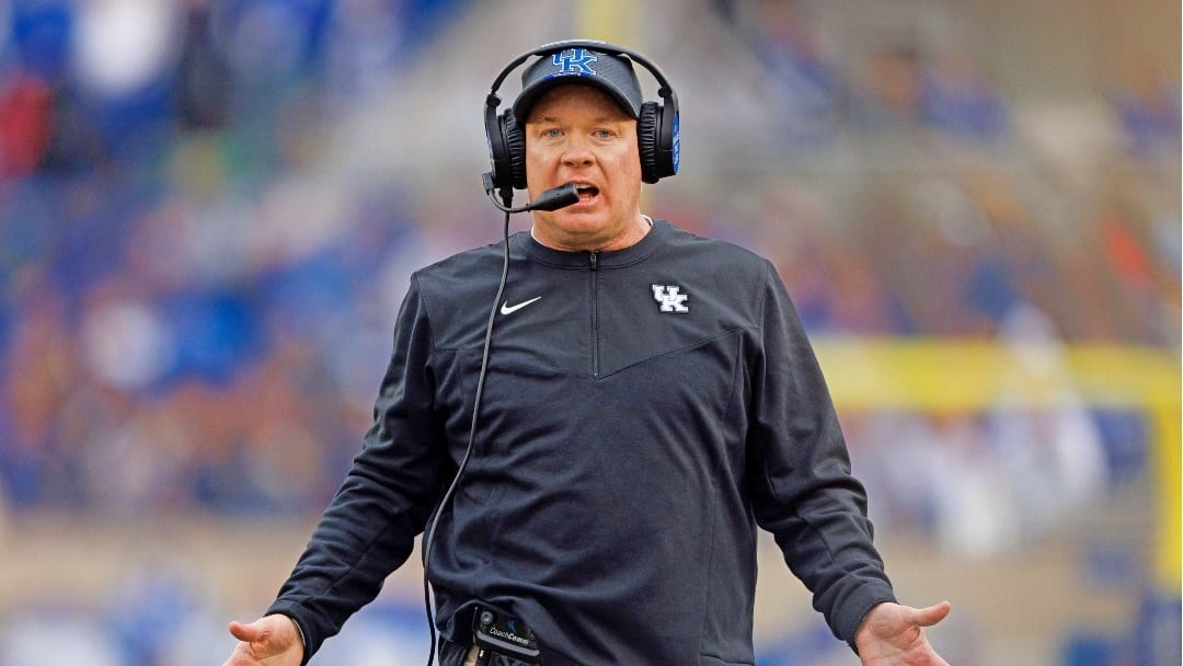 Kentucky head coach Mark Stoops reacts on the sideline during the first half of an NCAA college football game against Louisville in Lexington, Ky., Saturday, Nov. 26, 2022. (AP Photo/Michael Clubb)