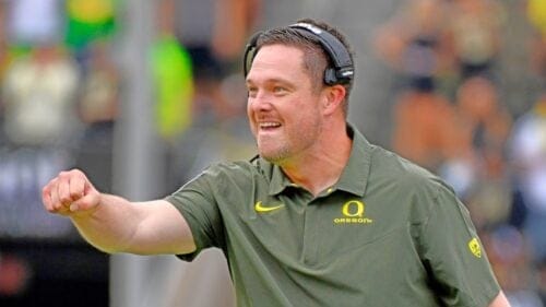 FILE - Oregon coach Dan Lanning reacts to a play against BYU during the first half of an NCAA college football game Sept. 17, 2022, in Eugene, Ore. Oregon and head coach Dan Lanning have agreed to a contract extension that will extend his deal through the 2028 season. The Oregon Board of Trustees unanimously approved the terms of the contract Thursday, July 27, 2023. Lanning’s new deal will pay him a total of $45 million in base salary over six years. (AP Photo/Andy Nelson, File)