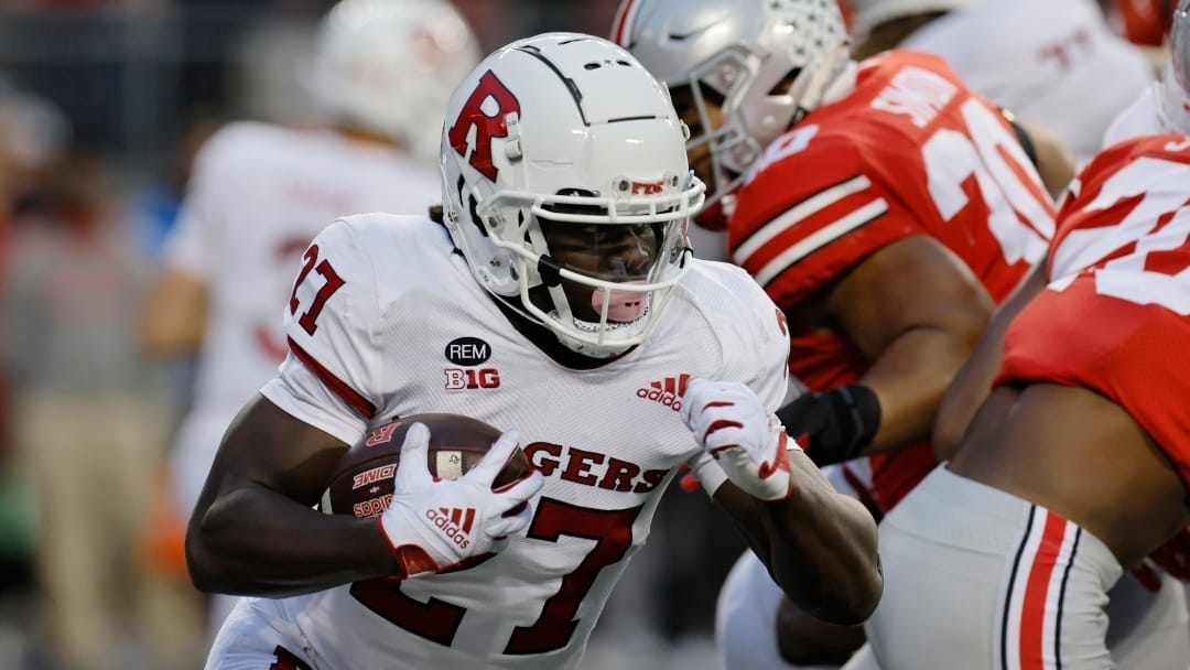 Rutgers running back Samuel Brown, left, runs up field against Ohio State during the second half of an NCAA college football game, Saturday, Oct. 1, 2022, in Columbus, Ohio. (AP Photo/Jay LaPrete)