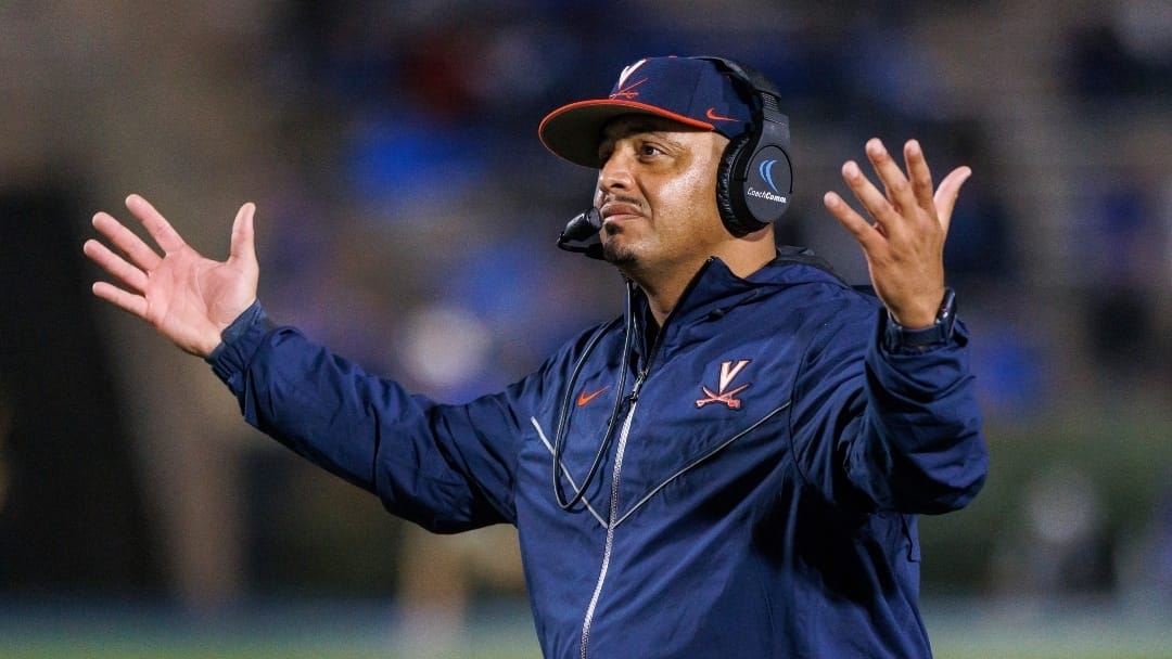 Virginia coach Tony Elliott reacts to a call on the field during the first half of the team's NCAA college football game against Duke in Durham, N.C., Saturday, Oct. 1, 2022.