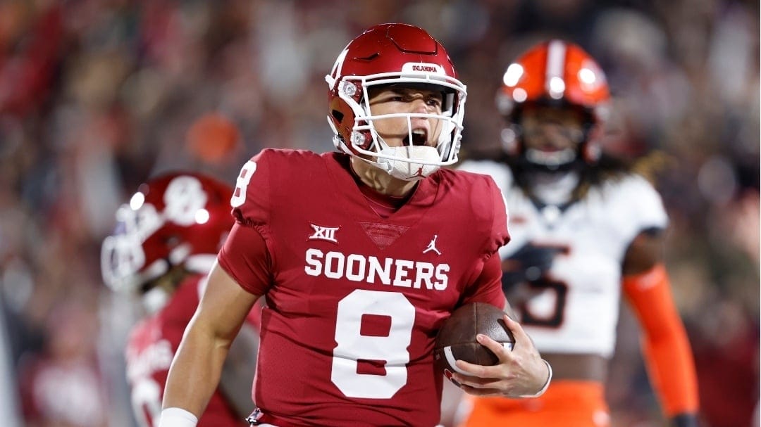 Oklahoma quarterback Dillon Gabriel (8) celebrates after a touchdown against Oklahoma State during the first half of an NCAA college football game Saturday, Nov. 19, 2022, in Norman, Okla. (AP Photo/Alonzo Adams)