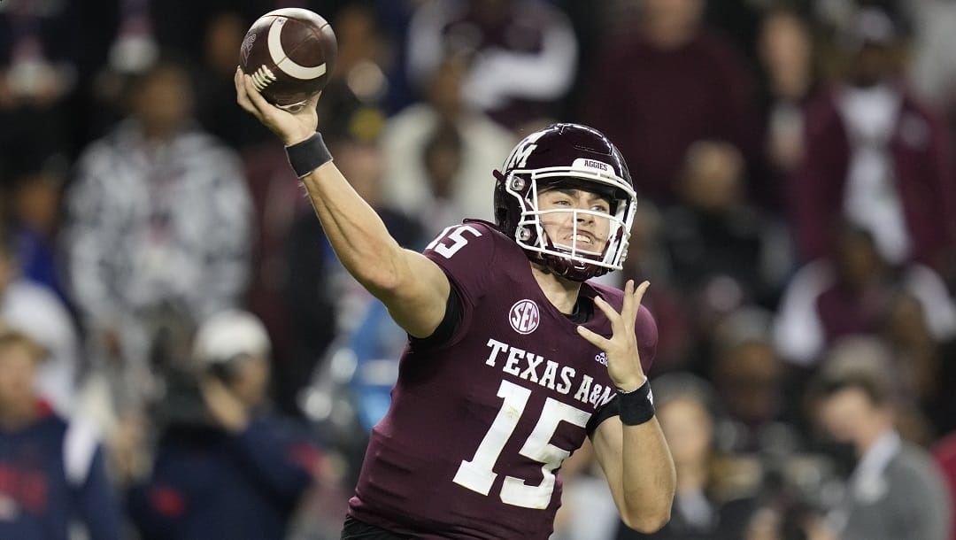 Texas A&M quarterback Conner Weigman (15) throws down field against Mississippi during the third quarter of an NCAA college football game Saturday, Oct. 29, 2022, in College Station, Texas. Texas A&M opens their season against New Mexico on Sept. 2.