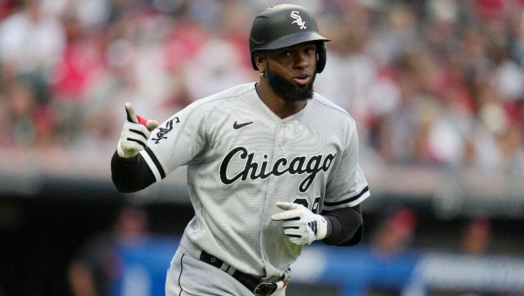 Chicago White Sox's Luis Robert Jr. gestures as he runs the bases with a home run in the third inning of a baseball game against the Cleveland Guardians, Saturday, Aug. 5, 2023, in Cleveland.