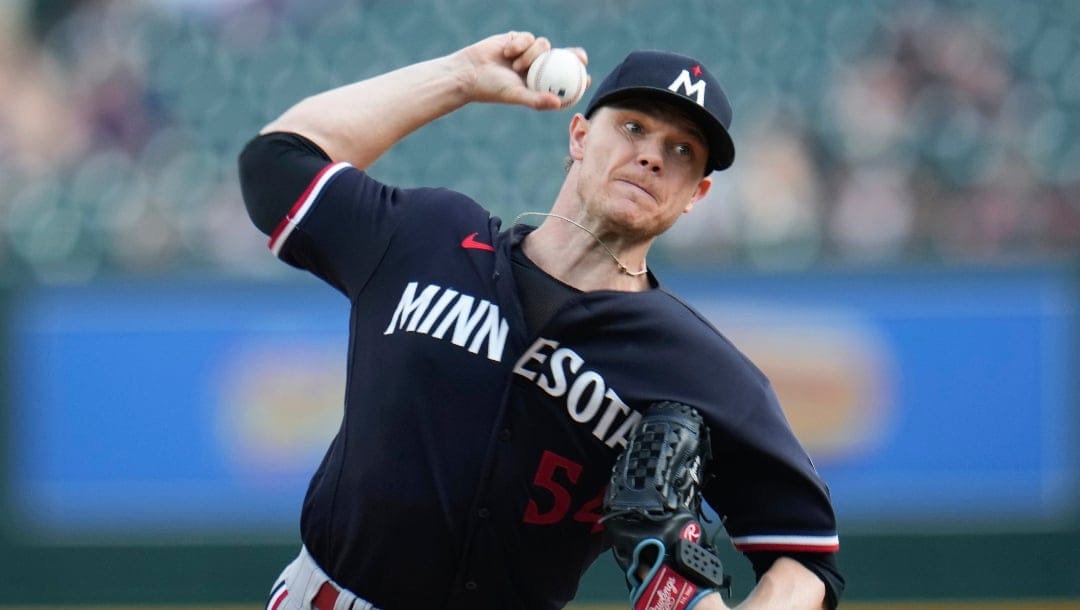 Minnesota Twins pitcher Sonny Gray throws against the Detroit Tigers in the first inning of a baseball game, Tuesday, Aug. 8, 2023, in Detroit. (AP Photo/Paul Sancya)