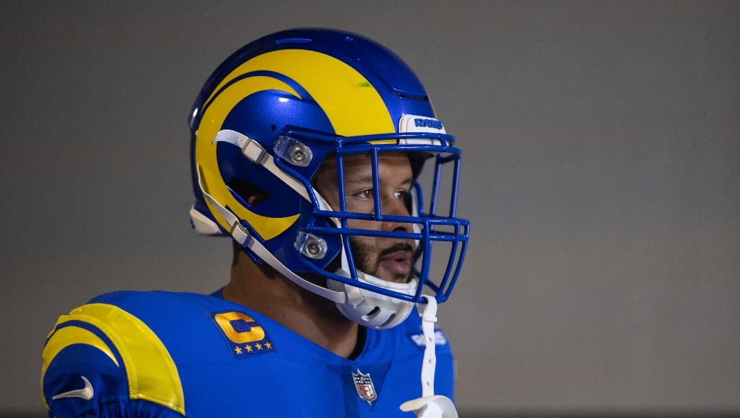 Los Angeles Rams defensive tackle Aaron Donald (99) waits to be introduced before an NFL football game against the San Francisco 49ers, Sunday, Oct. 30, 2022, in Inglewood, Calif. (AP Photo/Kyusung Gong)