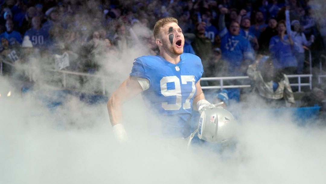 Detroit Lions defensive end Aidan Hutchinson is introduced before the first half of an NFL football game against the Chicago Bears, Sunday, Jan. 1, 2023, in Detroit. (AP Photo/Paul Sancya)