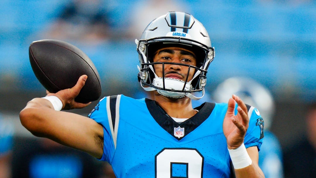 Carolina Panthers quarterback Bryce Young warms up before a preseason NFL football game against the Detroit Lions Friday, Aug. 25, 2023, in Charlotte, N.C. (AP Photo/Jacob Kupferman)