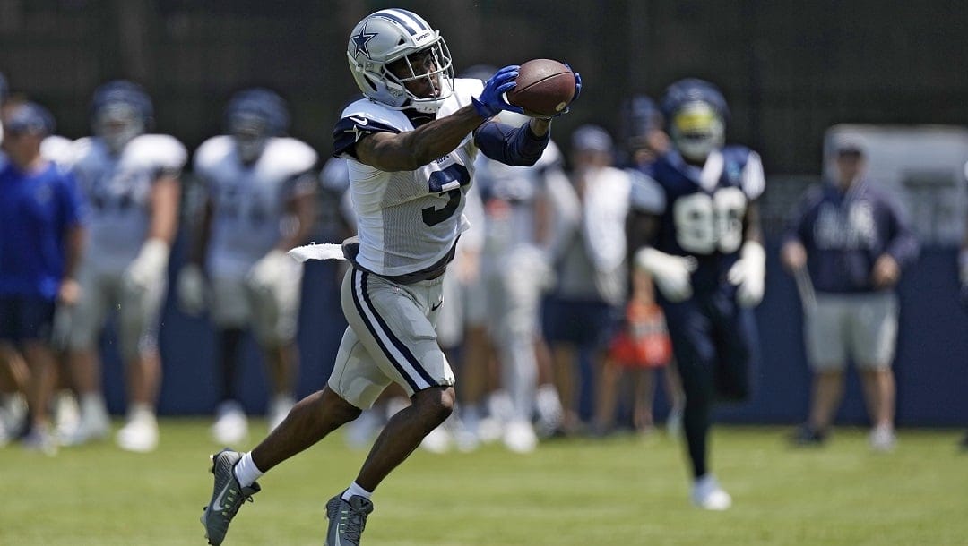 Dallas Cowboys wide receiver Brandin Cooks makes a catch during the NFL football team's training camp Monday, July 31, 2023, in Oxnard, Calif.