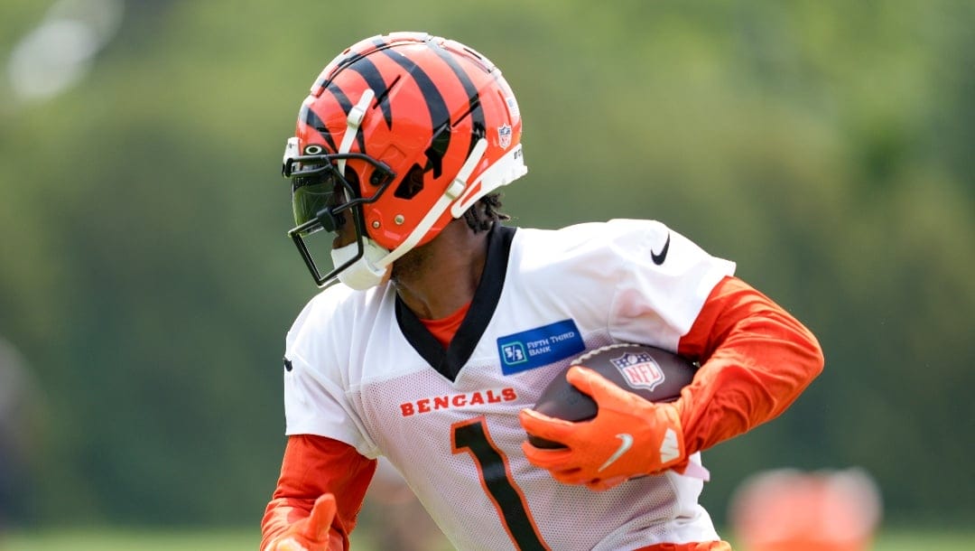 Cincinnati Bengals wide receiver Ja'Marr Chase (1) performs a drill during the NFL football team's training camp, Thursday, July 27, 2023, in Cincinnati. (AP Photo/Jeff Dean)