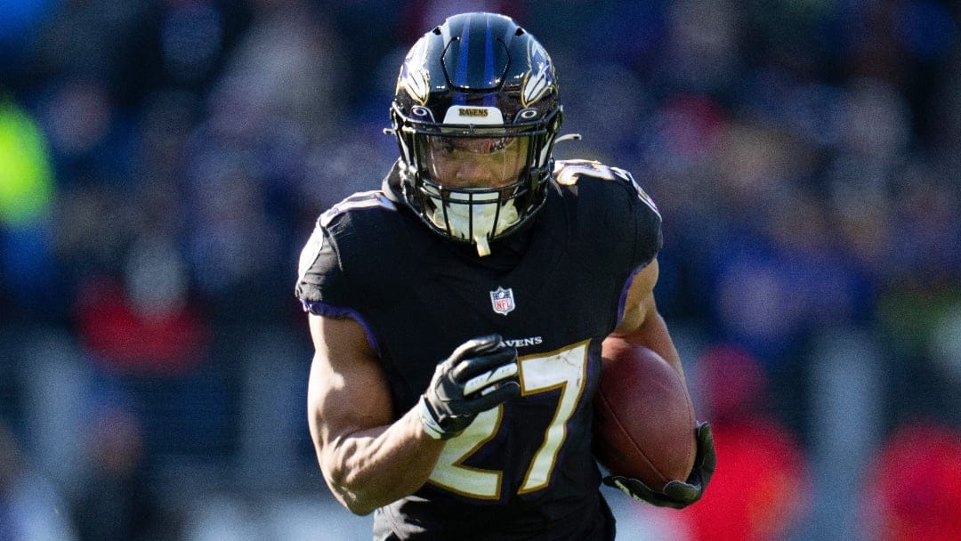 Baltimore Ravens running back J.K. Dobbins during the first half of an NFL football game between the Baltimore Ravens and the Atlanta Falcons, Saturday, Dec. 24, 2022, in Baltimore. The Ravens won 17-9. (AP Photo/Julio Cortez)