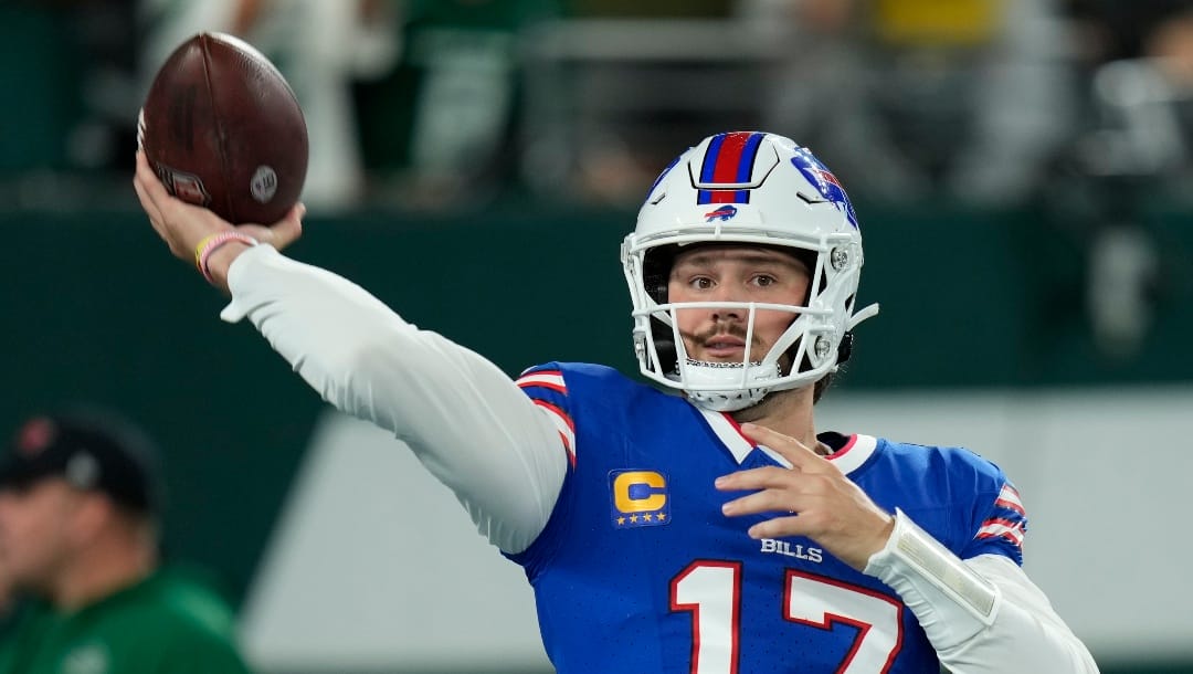 Buffalo Bills quarterback Josh Allen (17) warms up before playing against the New York Jets in an NFL football game, Monday, Sept. 11, 2023, in East Rutherford, N.J. (AP Photo/Seth Wenig)