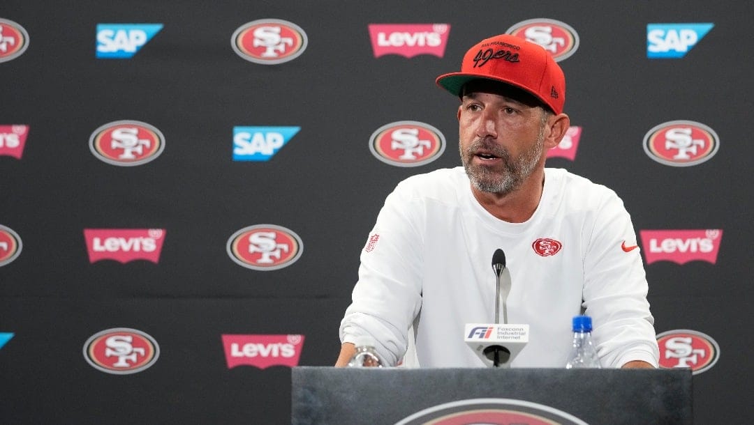 San Francisco 49ers head coach Kyle Shanahan speaks to reporters after NFL football training camp Sunday, July 30, 2023, in Santa Clara, Calif. (AP Photo/Godofredo A. Vásquez)