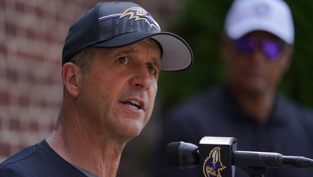 Baltimore Ravens head coach John Harbaugh speaks to reporters during his team's NFL football training camp, Wednesday, Aug. 2, 2023, in Owings Mills, Md.