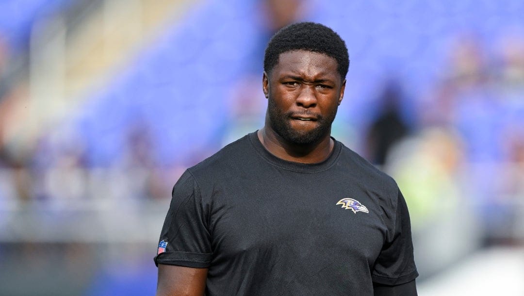 Baltimore Ravens linebacker Roquan Smith looks on during pre-game warm-ups before an NFL preseason football game against the Philadelphia Eagles, Saturday, Aug. 12, 2022, in Baltimore. (AP Photo/Terrance Williams)