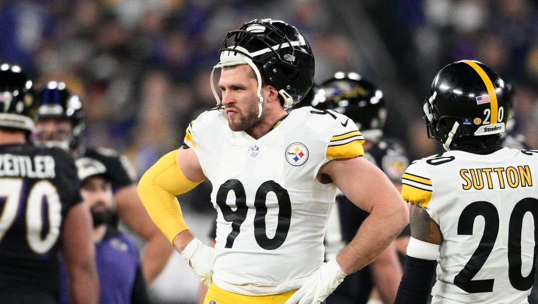 Pittsburgh Steelers linebacker T.J. Watt (90) looks on during the first half of an NFL football game against the Baltimore Ravens, Sunday, Jan. 1, 2023, in Baltimore. (AP Photo/Nick Wass)